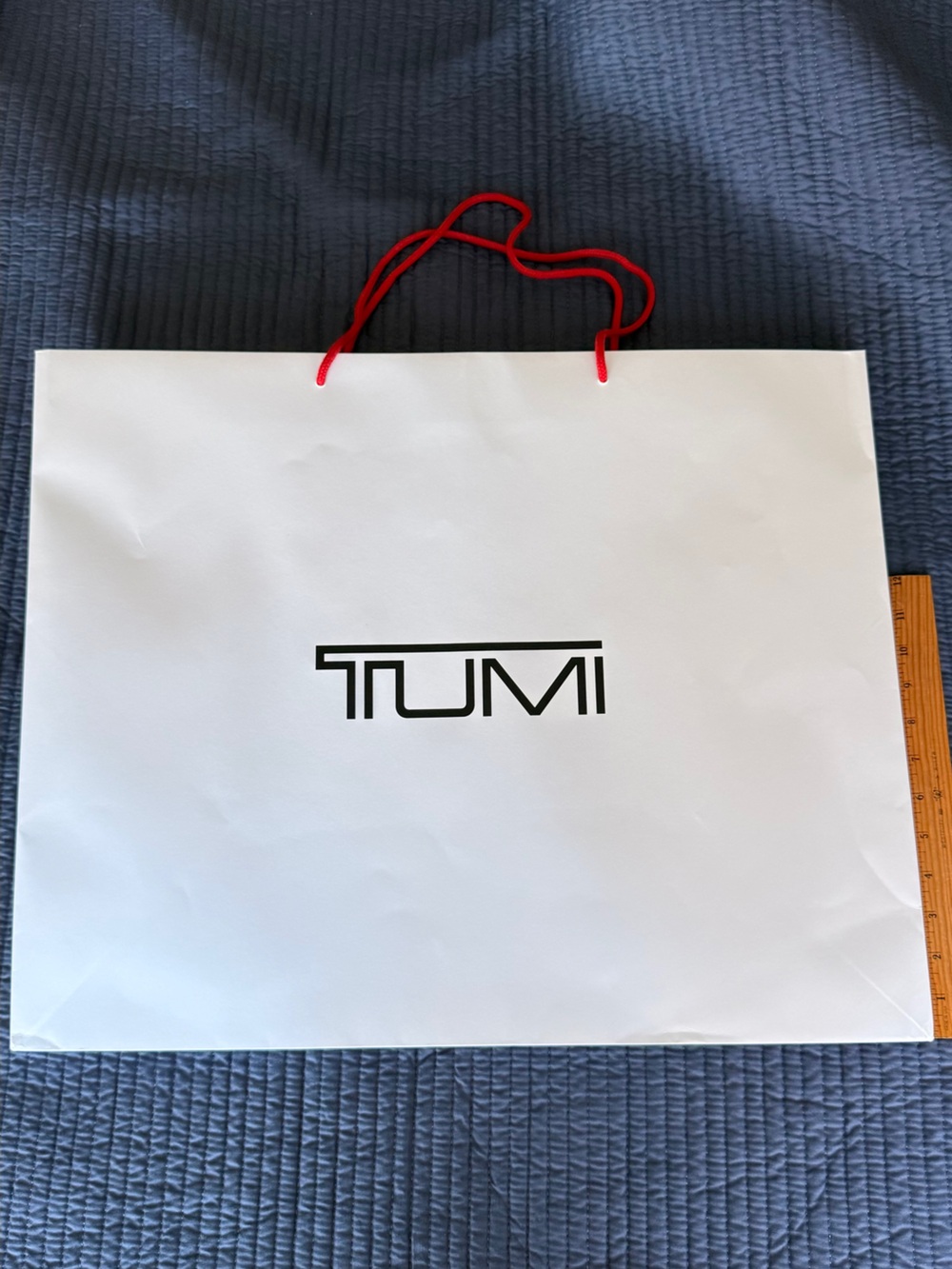 Tumi White Gift Bag with Red Rope Handles